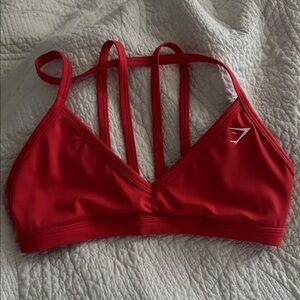 Whitney Simmons orange minimal sports bra